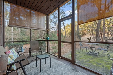 Nestled beneath a canopy of mature longleaf pines, this charming on Hyland Golf Club in North Carolina - for sale on GolfHomes.com, golf home, golf lot