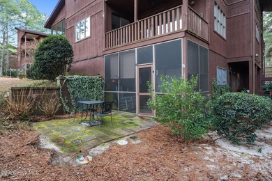 Nestled beneath a canopy of mature longleaf pines, this charming on Hyland Golf Club in North Carolina - for sale on GolfHomes.com, golf home, golf lot