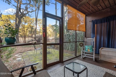 Nestled beneath a canopy of mature longleaf pines, this charming on Hyland Golf Club in North Carolina - for sale on GolfHomes.com, golf home, golf lot