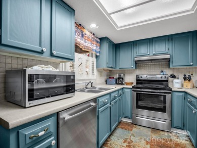 Stunning 2 bedroom/2 bathroom condo overlooking the golf course! on Rumbling Bald Resort on Lake Lure in North Carolina - for sale on GolfHomes.com, golf home, golf lot