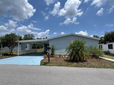 MOTIVATED SELLER! Tucked away in a peaceful Winter Haven 55+ on Lake Henry Golf Club in Florida - for sale on GolfHomes.com, golf home, golf lot