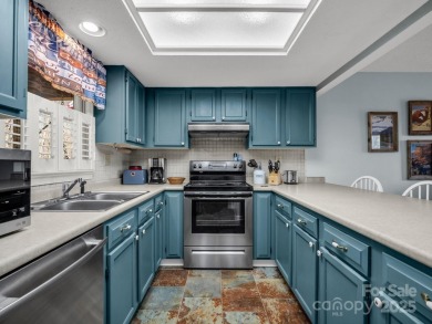 Stunning 2 bedroom/2 bathroom condo overlooking the golf course! on Rumbling Bald Resort on Lake Lure in North Carolina - for sale on GolfHomes.com, golf home, golf lot