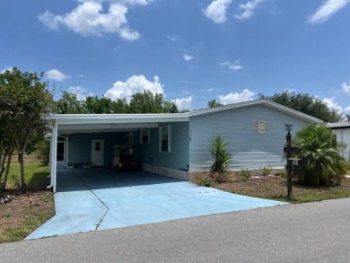 MOTIVATED SELLER! Tucked away in a peaceful Winter Haven 55+ on Lake Henry Golf Club in Florida - for sale on GolfHomes.com, golf home, golf lot