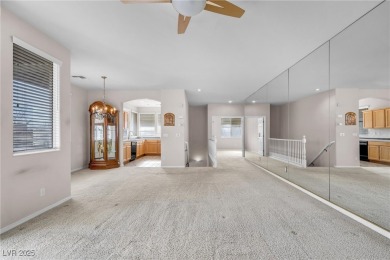 Discover luxury living in this stunning two-story corner unit on TPC at Summerlin in Nevada - for sale on GolfHomes.com, golf home, golf lot