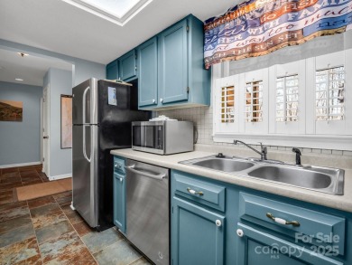 Stunning 2 bedroom/2 bathroom condo overlooking the golf course! on Rumbling Bald Resort on Lake Lure in North Carolina - for sale on GolfHomes.com, golf home, golf lot
