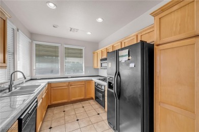 Discover luxury living in this stunning two-story corner unit on TPC at Summerlin in Nevada - for sale on GolfHomes.com, golf home, golf lot