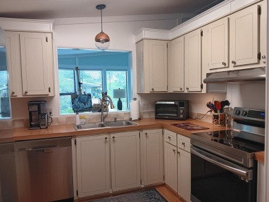 OWN YOUR LAND in this 55+ active community. This updated and on Heritage Ridge Golf Club in Florida - for sale on GolfHomes.com, golf home, golf lot