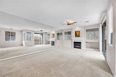 Discover luxury living in this stunning two-story corner unit on TPC at Summerlin in Nevada - for sale on GolfHomes.com, golf home, golf lot