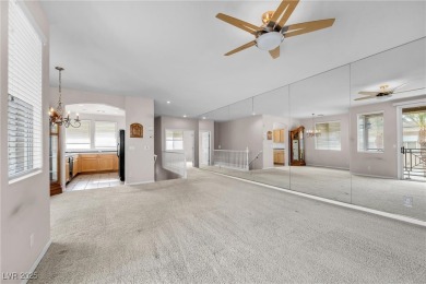 Discover luxury living in this stunning two-story corner unit on TPC at Summerlin in Nevada - for sale on GolfHomes.com, golf home, golf lot