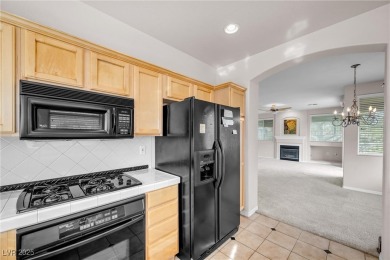 Discover luxury living in this stunning two-story corner unit on TPC at Summerlin in Nevada - for sale on GolfHomes.com, golf home, golf lot
