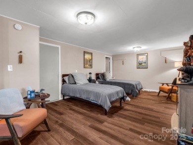 Stunning 2 bedroom/2 bathroom condo overlooking the golf course! on Rumbling Bald Resort on Lake Lure in North Carolina - for sale on GolfHomes.com, golf home, golf lot