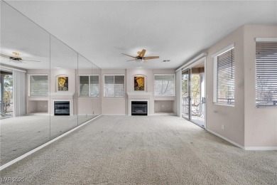 Discover luxury living in this stunning two-story corner unit on TPC at Summerlin in Nevada - for sale on GolfHomes.com, golf home, golf lot