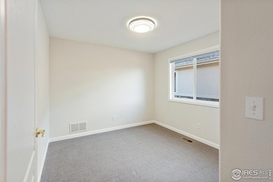 Experience the ultimate lock-and-leave lifestyle with a perfect on Highland Meadows Golf Course in Colorado - for sale on GolfHomes.com, golf home, golf lot