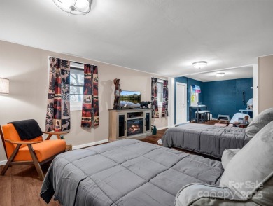 Stunning 2 bedroom/2 bathroom condo overlooking the golf course! on Rumbling Bald Resort on Lake Lure in North Carolina - for sale on GolfHomes.com, golf home, golf lot