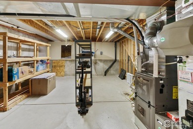 Experience the ultimate lock-and-leave lifestyle with a perfect on Highland Meadows Golf Course in Colorado - for sale on GolfHomes.com, golf home, golf lot