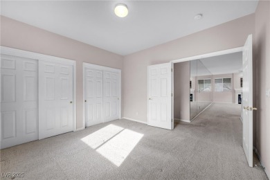 Discover luxury living in this stunning two-story corner unit on TPC at Summerlin in Nevada - for sale on GolfHomes.com, golf home, golf lot