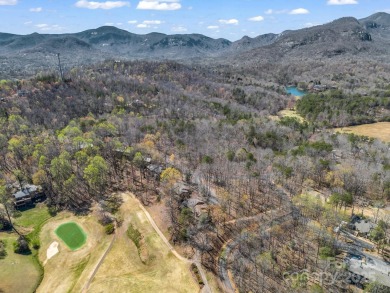 Stunning 2 bedroom/2 bathroom condo overlooking the golf course! on Rumbling Bald Resort on Lake Lure in North Carolina - for sale on GolfHomes.com, golf home, golf lot