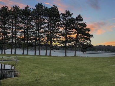 Enjoy lakeside living with this 2BR/2BA condo at the Spider Lake on Spider Lake Golf Resort in Wisconsin - for sale on GolfHomes.com, golf home, golf lot