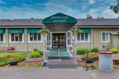 Enjoy lakeside living with this 2BR/2BA condo at the Spider Lake on Spider Lake Golf Resort in Wisconsin - for sale on GolfHomes.com, golf home, golf lot