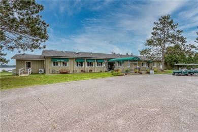 Enjoy lakeside living with this 2BR/2BA condo at the Spider Lake on Spider Lake Golf Resort in Wisconsin - for sale on GolfHomes.com, golf home, golf lot