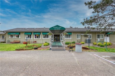 Enjoy lakeside living with this 2BR/2BA condo at the Spider Lake on Spider Lake Golf Resort in Wisconsin - for sale on GolfHomes.com, golf home, golf lot