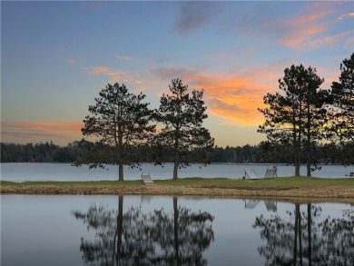 Enjoy lakeside living with this 2BR/2BA condo at the Spider Lake on Spider Lake Golf Resort in Wisconsin - for sale on GolfHomes.com, golf home, golf lot
