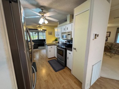 MOTIVATED SELLER! Don't miss this spacious, beautiful home in on Lake Henry Golf Club in Florida - for sale on GolfHomes.com, golf home, golf lot