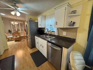 MOTIVATED SELLER! Don't miss this spacious, beautiful home in on Lake Henry Golf Club in Florida - for sale on GolfHomes.com, golf home, golf lot