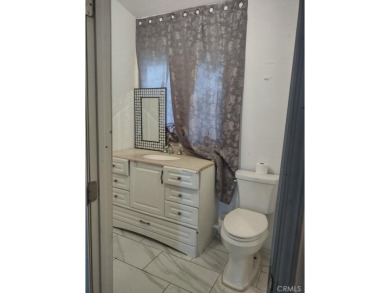 LIVE IN ONE AND RENT THE SECOND UNIT!!   YOU HAVE TO COME TO SEE on Hesperia Golf and Country Club in California - for sale on GolfHomes.com, golf home, golf lot