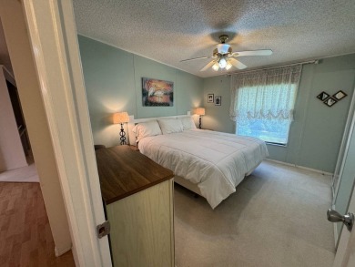 MOTIVATED SELLER! Don't miss this spacious, beautiful home in on Lake Henry Golf Club in Florida - for sale on GolfHomes.com, golf home, golf lot