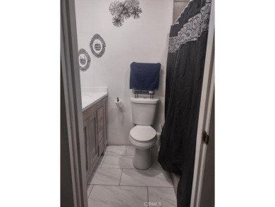 LIVE IN ONE AND RENT THE SECOND UNIT!!   YOU HAVE TO COME TO SEE on Hesperia Golf and Country Club in California - for sale on GolfHomes.com, golf home, golf lot