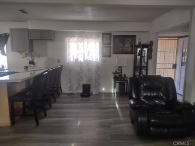 LIVE IN ONE AND RENT THE SECOND UNIT!!   YOU HAVE TO COME TO SEE on Hesperia Golf and Country Club in California - for sale on GolfHomes.com, golf home, golf lot