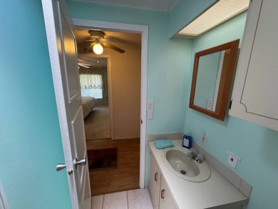 MOTIVATED SELLER! Don't miss this spacious, beautiful home in on Lake Henry Golf Club in Florida - for sale on GolfHomes.com, golf home, golf lot