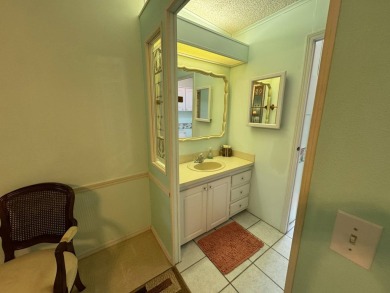 MOTIVATED SELLER! Don't miss this spacious, beautiful home in on Lake Henry Golf Club in Florida - for sale on GolfHomes.com, golf home, golf lot