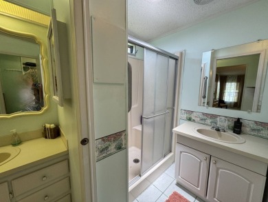 MOTIVATED SELLER! Don't miss this spacious, beautiful home in on Lake Henry Golf Club in Florida - for sale on GolfHomes.com, golf home, golf lot