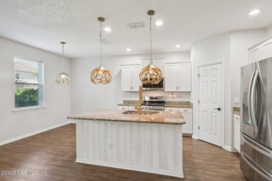 Welcome to this stunning 3-bedroom, 3.5-bath home in the heart on Palm Valley Golf Club in Florida - for sale on GolfHomes.com, golf home, golf lot