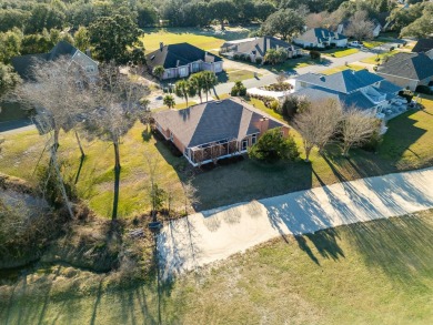 Nestled on the serene Shalimar Pointe Golf Course, this stunning on Shalimar Pointe Golf and Country Club in Florida - for sale on GolfHomes.com, golf home, golf lot