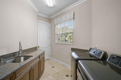**CHARMING and PRIVATE, GOLF COURSE ESTATE** is located behind on The Oaks Club in Florida - for sale on GolfHomes.com, golf home, golf lot