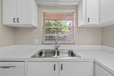 WELCOME HOME TO LIVE OAK CONDOS LOCATED IN PINE ISLAND RIDGE on Pine Island Ridge Country Club in Florida - for sale on GolfHomes.com, golf home, golf lot