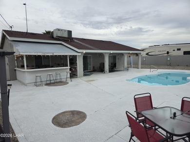 Gorgeous home in a great location with nice views and own Golf on London Bridge Golf Course in Arizona - for sale on GolfHomes.com, golf home, golf lot