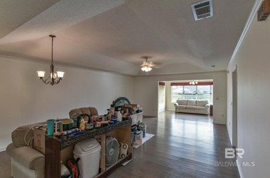 Tucked inside the natural beauty of Glenlakes Golf Club, this on Glenlakes Golf Club in Alabama - for sale on GolfHomes.com, golf home, golf lot