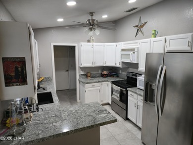 Gorgeous home in a great location with nice views and own Golf on London Bridge Golf Course in Arizona - for sale on GolfHomes.com, golf home, golf lot