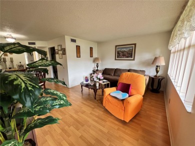 HOME SWEET HOME! Live in this Sunrise resort-like community on Sunrise Lakes Phase III in Florida - for sale on GolfHomes.com, golf home, golf lot