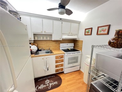 HOME SWEET HOME! Live in this Sunrise resort-like community on Sunrise Lakes Phase III in Florida - for sale on GolfHomes.com, golf home, golf lot