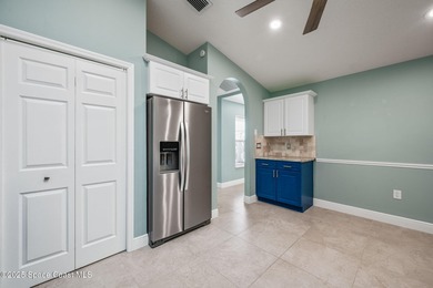 FORE! Just park your golf cart in your garage. Home handy to on Suntree Country Club in Florida - for sale on GolfHomes.com, golf home, golf lot