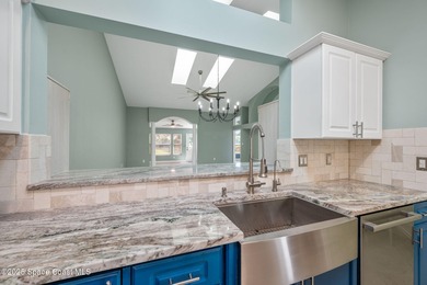 FORE! Just park your golf cart in your garage. Home handy to on Suntree Country Club in Florida - for sale on GolfHomes.com, golf home, golf lot