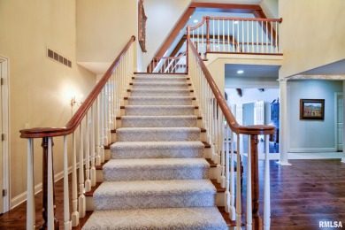 This custom built all brick home situated on the signature fifth on WeaverRidge Golf Club in Illinois - for sale on GolfHomes.com, golf home, golf lot