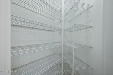 FORE! Just park your golf cart in your garage. Home handy to on Suntree Country Club in Florida - for sale on GolfHomes.com, golf home, golf lot