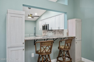 FORE! Just park your golf cart in your garage. Home handy to on Suntree Country Club in Florida - for sale on GolfHomes.com, golf home, golf lot