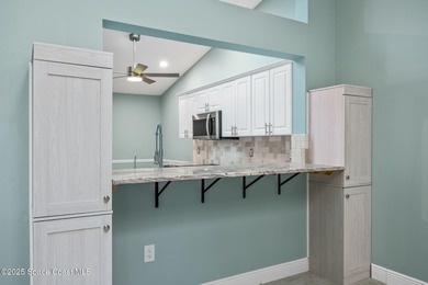 FORE! Just park your golf cart in your garage. Home handy to on Suntree Country Club in Florida - for sale on GolfHomes.com, golf home, golf lot